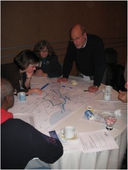 People playing the Dots and Dashes Board game